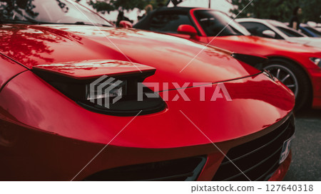 red old car parked 127640318