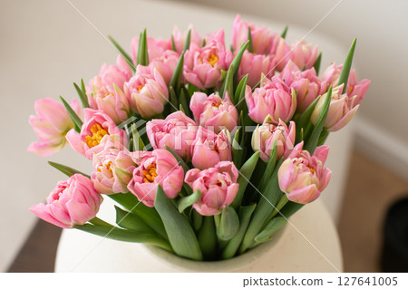 Vibrant Pink Tulips Bouquet in White Vase 127641005