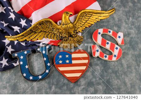 Festive arrangement showcasing an eagle symbols of United States, perfect for national celebration event. Festive arrangement showcasing an eagle symbols of United States, perfect for national celebration event. 127641040