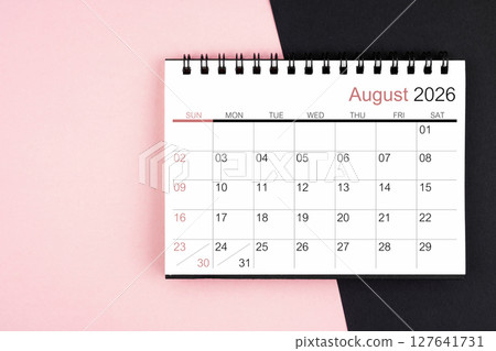 August 2026 desk calendar on pink and black color background, Flat lay. August 2026 desk calendar on pink and black color background, Flat lay. 127641731