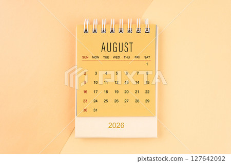 August 2026 mini desk calendar on the yellow, planning for business meeting concept. August 2026 mini desk calendar on the yellow, planning for business meeting concept. 127642092