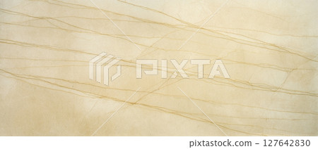 Elegant Calacatta marble slab with fine golden veins on beige background 127642830