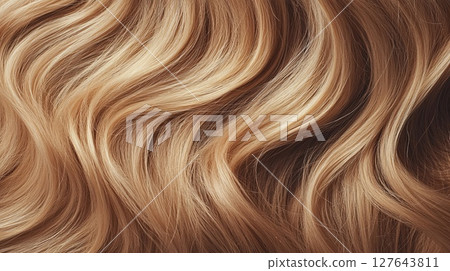 Soft-textured honey blonde strands with curl detail . Soft-textured honey blonde strands with curl detail . 127643811