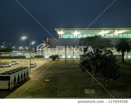Cordoba, Argentina - June 22, 2025: The Ingeniero Aeronautico Ambrosio L.V. Taravella International Airport building in the pre-dawn hours. 127644506