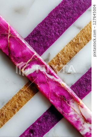 Semiprecious marble detail with gold, magenta and violet layers 127645004