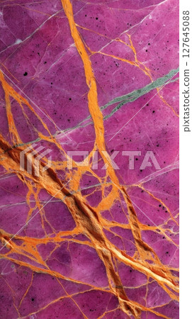 Semiprecious purple marble with orange and gold veins, luxury decorative stone background, closeup mineral surface, unique agate slab texture, abstract gemstone pattern for modern design 127645088