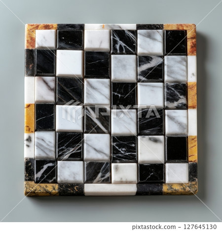 Compact black and white marble chessboard with golden frame detail Compact black and white marble chessboard with golden frame detail 127645130
