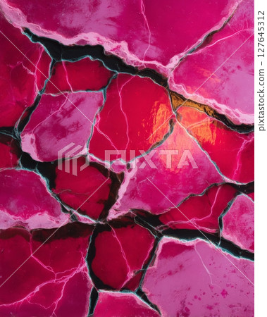 Rosso Levanto marble texture with bold crimson slabs and deep veins 127645312