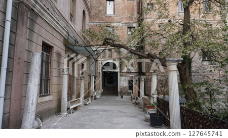 Turkish courtyard with old buildings in the old town, Istanbul, Turkey 127645741