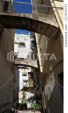 Arch in old town at Bari in Apulia. Bari is the capital city of Apulia region on the Adriatic sea, in southern Italy 127645757