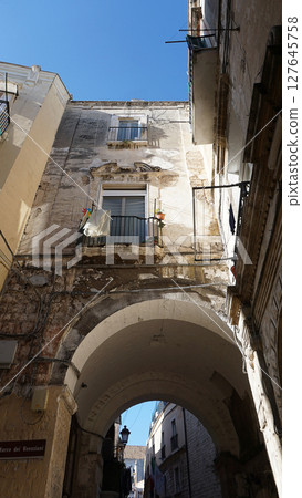 Arch in old town at Bari in Apulia. Bari is the capital city of Apulia region on the Adriatic sea, in southern Italy 127645758