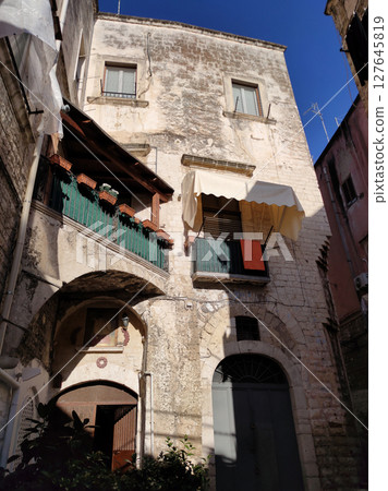 Street in old town at Bari in Apulia. Bari is the capital city of Apulia region on the Adriatic sea, in southern Italy Street in old town at Bari in Apulia. Bari is the capital city of Apulia region on the Adriatic sea, in southern Italy 127645819