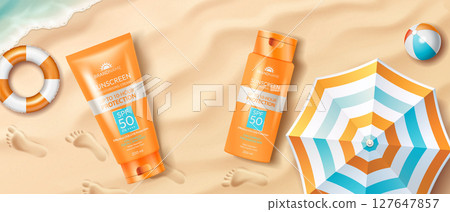 Beach scene with sunscreen and umbrella 127647857