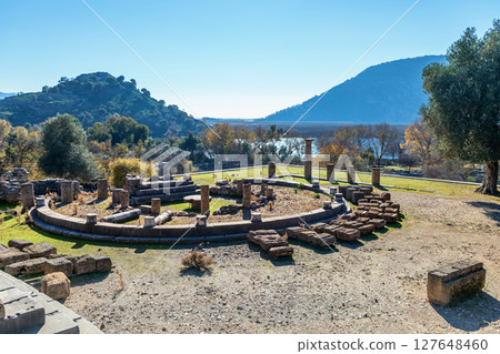 View of ancient Greek city Kaunos in Caria or Caunus in Roman period in Anatolia. Famous historical and archeological site. Popular place for family travel on summer vacation. Dalyan, Mugla Turkey 127648460