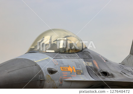 Close up F-16A fighter jet cockpit side view at airshow in Thailand. 127648472