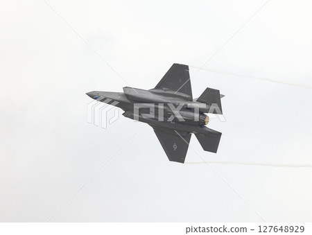 Lockheed Martin F35 Lightning II Multirole strike fighter at airshow. 127648929