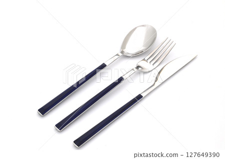 Overhead shot of silverware on White background with copy space 127649390