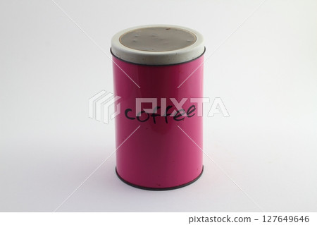 Colorful pink tin storage container on floral pattern 127649646