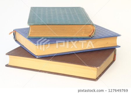 pile of books isolated on white background 127649769