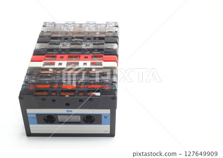 Retro audio cassette tape from the 80s and 90s on a white background. 127649909