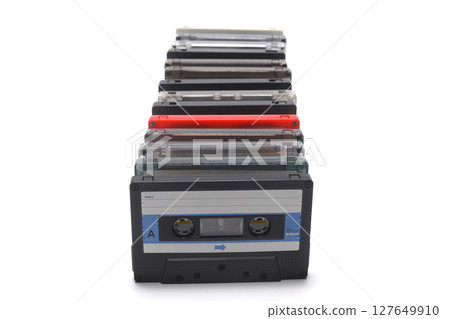 Retro audio cassette tape from the 80s and 90s on a white background. 127649910