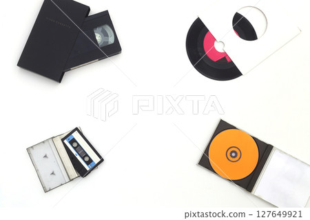 Vinyl record, cd, audio and video cassettes top view 127649921