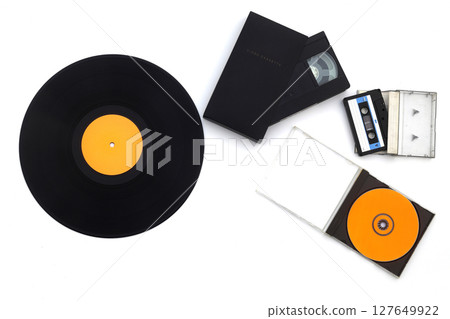 Vinyl record, cd, audio and video cassettes top view Vinyl record, cd, audio and video cassettes top view 127649922