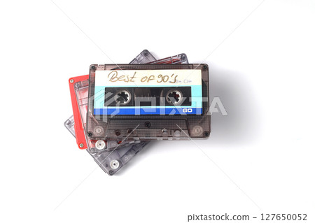 Retro audio cassette tape from the 80s and 90s on a white background. 127650052