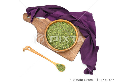 Dry mint in wooden bowl isolated on white background 127650327