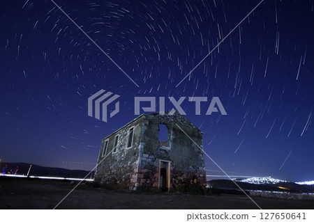 A view of the stars of the Milky Way with a mountain top in the foreground.Perseid Meteor Shower observation A view of the stars of the Milky Way with a mountain top in the foreground.Perseid Meteor Shower observation 127650641