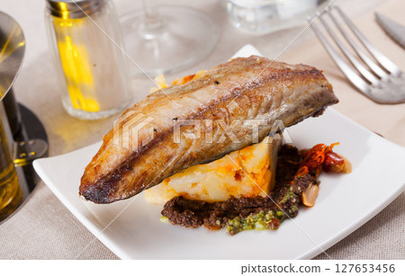 Fried scomber with potatoes Fried scomber with potatoes 127653456