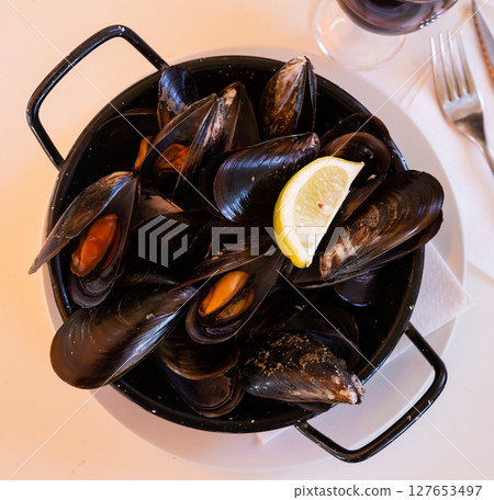 Steam cooked mussels Steam cooked mussels 127653497