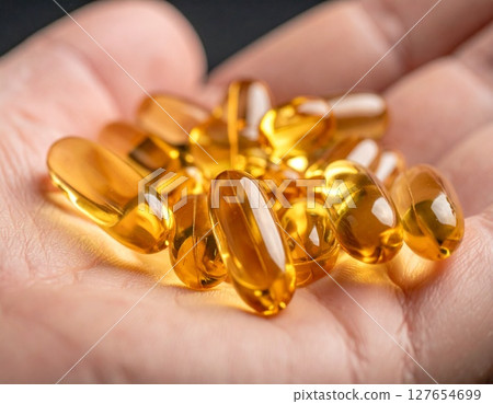 Supplements in the palm of your hand 127654699
