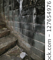 Gloomy stairs and walls background material 127654976
