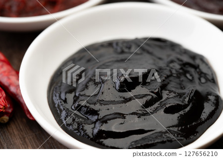 Sweet bean sauce in a small dish Sweet bean sauce in a small dish 127656210