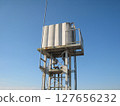 Rooftop elevated water tank 127656232