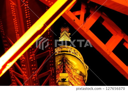 Tokyo Tower shining in the night sky 127656870