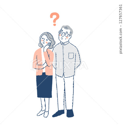 A worried senior couple looking to the left A worried senior couple looking to the left 127657361