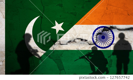Pakistan vs India flag on cracked wall. Conflict between India and Pakistan concept. Political tension between India and Pakistan 127657742