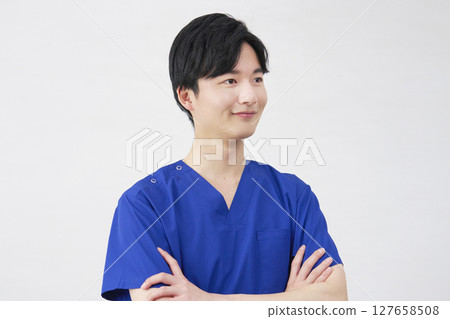 Doctor, nurse, dentist, caregiver male portrait white background Doctor, nurse, dentist, caregiver male portrait white background 127658508