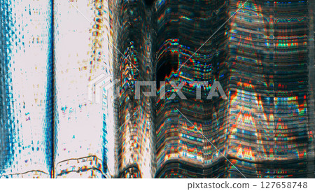 Technology interference. Transmission glitch. Blue orange white color noise old film dust scratches fractured distressed texture on black abstract background. 127658748
