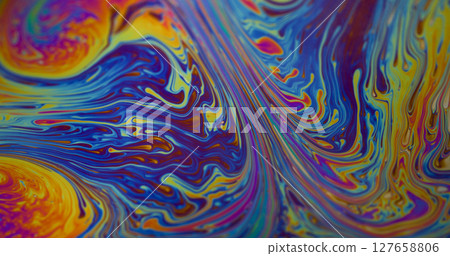 Wave blend. Bubble liquid. Blur yellow green blue color ink flowing pink red stains floating on abstract round oil wet background. 127658806