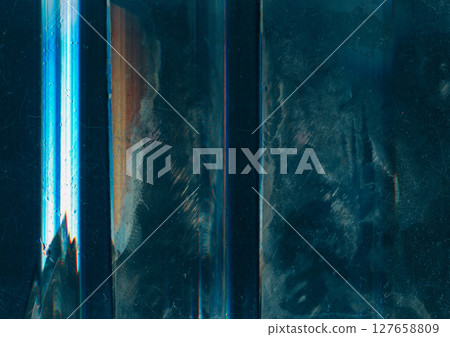 Weathered glass. Dust scratches. Orange blue rainbow flare noise dirt stains water drops old film overlay on dark black wet aged window texture abstract background. Weathered glass. Dust scratches. Orange blue rainbow flare noise dirt stains water drops old film overlay on dark black wet aged window texture abstract background. 127658809