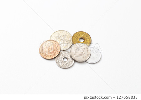 Japanese coins on white background 127658835