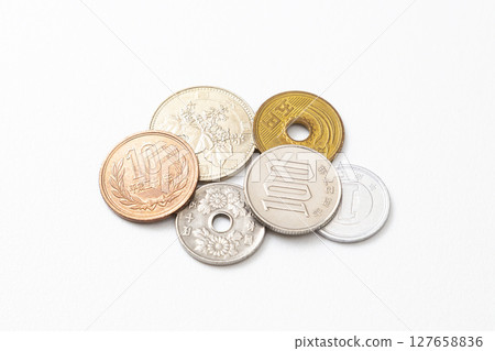 Japanese coins on white background 127658836