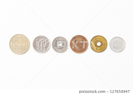Japanese coins on white background Japanese coins on white background 127658947