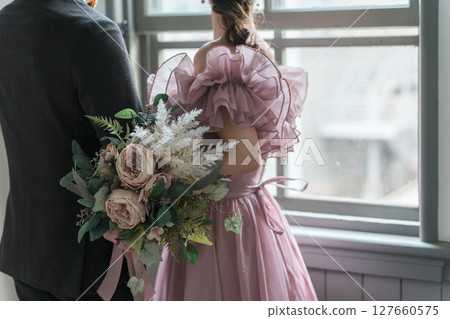 Western-style house, wedding hall, couple taking wedding photos in pink dresses Western-style house, wedding hall, couple taking wedding photos in pink dresses 127660575