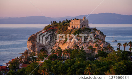 Sanctuary of Santa Maria dell Isola overlooking Tropea at sunset, Calabria, Italy Sanctuary of Santa Maria dell Isola overlooking Tropea at sunset, Calabria, Italy 127660684