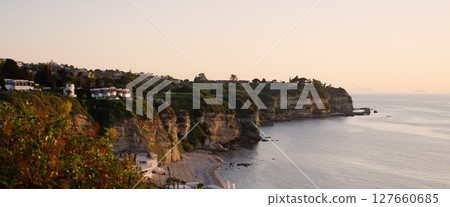 Tropea, Calabria, cliff overlooking the Tyrrhenian Sea at sunset Tropea, Calabria, cliff overlooking the Tyrrhenian Sea at sunset 127660685