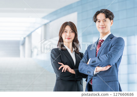Business person with arms folded 127660686